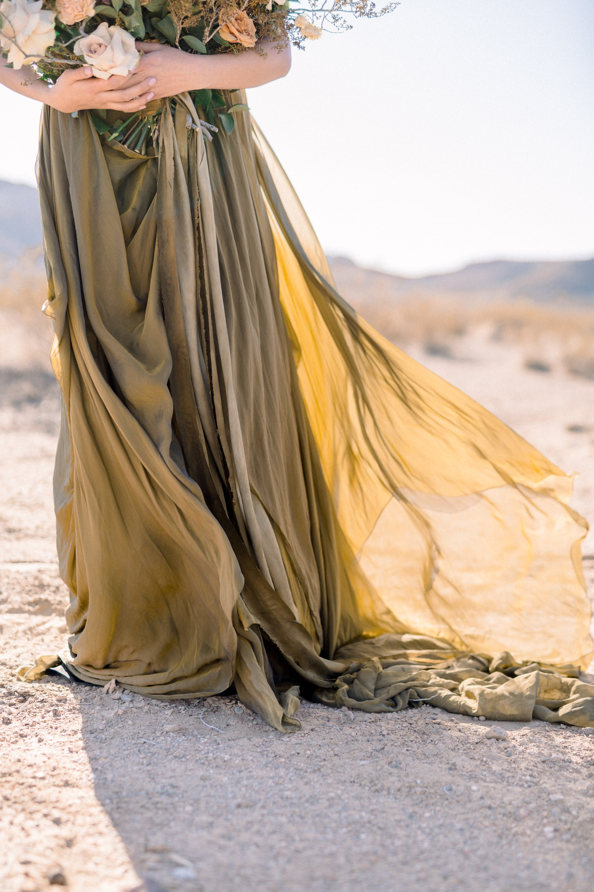 Desert Wedding Elopement featuring a gorgeous Carol Hannah bridal gown.